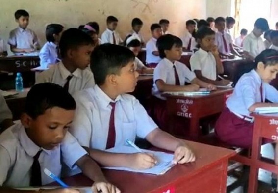 Scariest scenario caught on camera : Offline mode exam is taking in Schools without maintaining distance and masks in Tripura School Scariest scenario caught on camera : Offline mode exam is taking in Schools without maintaining distance and masks in Tripura School